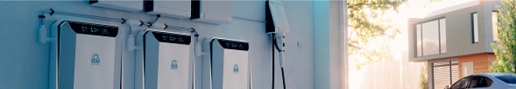 Electric vehicle charging stations outside a modern building, illustrating sustainable transportation solutions and clean energy initiatives.