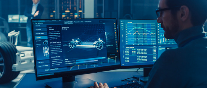 Professional engineer at Goken Global conducting advanced automotive design analysis on multiple high-definition screens, showcasing cutting-edge vehicle modeling and performance data metrics in a modern engineering lab setting.